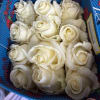 25 long stemmed Ecuadorian roses in the color vendela white