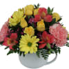 Colourful, uplifting flower arrangement that's sure to bring a smile to