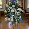 Sincerely Heartfelt is a graceful standing spray designed to offer comfort, peace