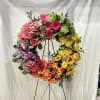 A classic wreath representing eternal life and unbroken love.