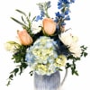Fresh, airy, and reminiscent of sunshine on a summer porch, the Blue