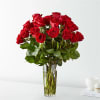 Bouquet of red roses in a clear glass vase