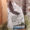Decorative stone plaque with an eagle and Bible verse
