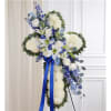 Celebrate a life of faith and devotion with our elegant sympathy arrangement.