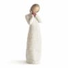 Cream-colored figurine of a girl holding a pink heart