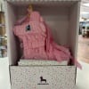 Pink unicorn piñata in a display box