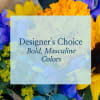 Mixed bouquet with yellow sunflowers, blue flowers, and orange blooms