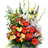 Tall mixed bouquet with red gerberas, roses, and white lilies