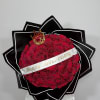 Natural Red roses wrapped in black with a white edge. Created to