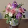 This arrangement of Hydrangeas, stock and roses give that homey feel with