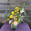 Brighten up the room with some bright, sunny flowers.