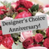 Pink and red rose bouquet with an anniversary sign
