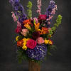 A tall, jubilant arrangement that reads like a celebration in bloom-perfect as