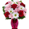 A beautiful design filled with a delightful arrangement of spring flowers: alstroemeria