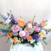 A showstopping display of spring's best pastels.

The blooms used may vary by