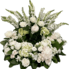 Pure Remembrance is a timeless and elegant floral tribute of all-white blooms