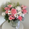 Nice and cute arrangement in a plastic vase.