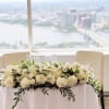 Simple but elegant sweetheart table decor. Color can be adjusted to your
