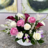 A garden-fresh statement that can read either serene or celebratory, this flower