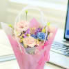 This bouquet will come with water source strapped in tissue paper and
