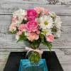 Your loved one will be tickled pink when they get this arrangement.