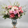 Pink and white mixed bouquet in a glass vase