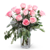 Pink roses arranged in a clear glass vase