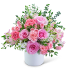 Pink roses and carnations in a white vase