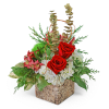 Red roses and white flowers in a bark-textured square container