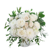 White roses and chrysanthemums in a clear glass vase