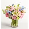 Mixed pastel bouquet in a clear glass vase