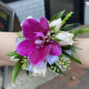 Wrist corsage with purple orchid and white roses