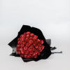 Bouquet of red roses wrapped in black paper