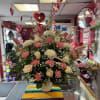 The Pink Memory is a beautifully handcrafted floral display designed to complement