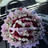 Large bouquet of red, pink, and white roses with pale alstroemeria