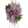 "Console and comfort with this luxurious spray of lavender roses, alstroemeria and