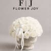 A refined and elegant floral arrangement featuring premium white roses beautifully composed