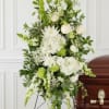 A timeless expression of peace and remembrance, this standing spray features a