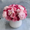 A stunning expression of elegance and romance, this lavish arrangement features layers