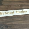 White ribbon printed with 