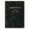 Black marbled notebook titled 
