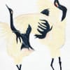 Watercolor painting of two white cranes with black necks and red facial markings