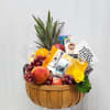 Fruit and cheese gift basket with grapes, peach, pineapple, and packaged snacks