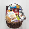 Basket of assorted packaged snacks and crackers