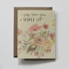 Floral greeting card with handwritten text on a kraft envelope