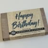 Birthday candy gift box on a white surface