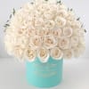 White rose bouquet in a turquoise hat box
