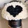 Black and ivory boxed rose arrangement with black heart-shaped rose cluster on top