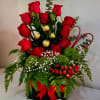 This charming floral gift features fresh 12 red roses paired with assorted