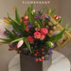 A beautiful luxury flower arrangement in San Antonio featuring fresh tulips, spray